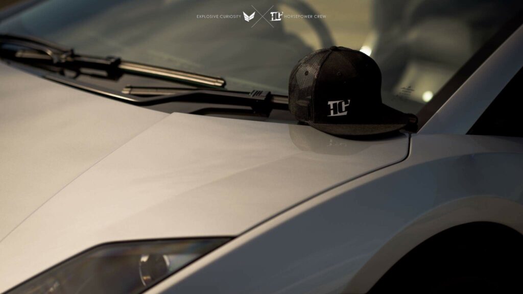 Hat-black-with-white-HC-on-lambo-angle